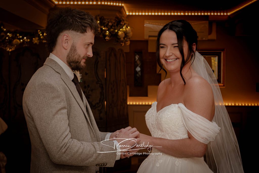 Yorkshire Wedding Photographer - Bride and Groom Exchanging Rings at Whitley Hall