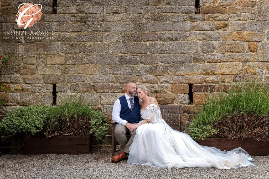 Award-winning portrait of Bride and Groom at Danby Castle Barn