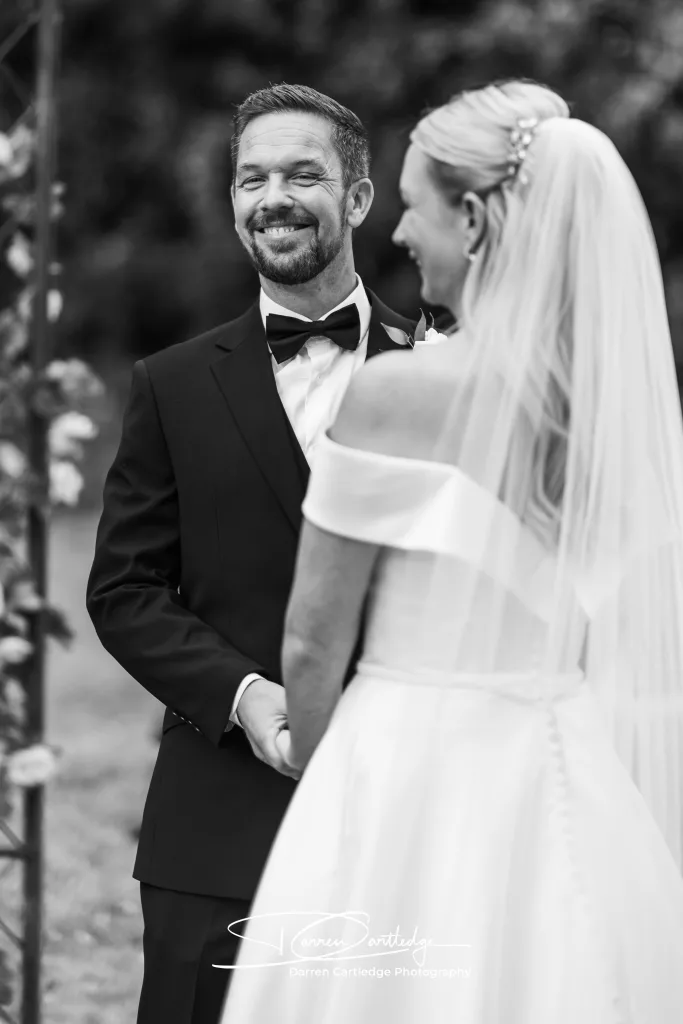 Bride and groom sharing a joyful laugh during their ceremony-only wedding in Yorkshire, captured naturally to reflect their connection.