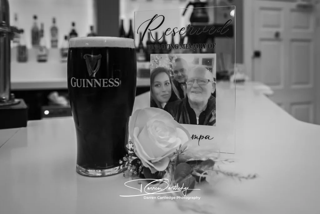 A pint of Guinness and buttonhole placed in honour of Grandpa at Bawtry Hall, South Yorkshire